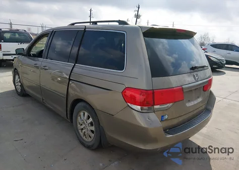 2010 Honda Odyssey Ex-L z USA, uszkodzony, nr VIN 5FNRL3H79AB090849